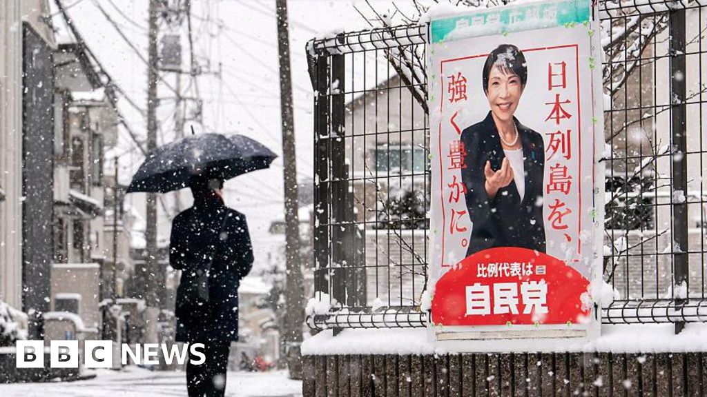 Japanese people brave snow to vote in rare mid-winter election