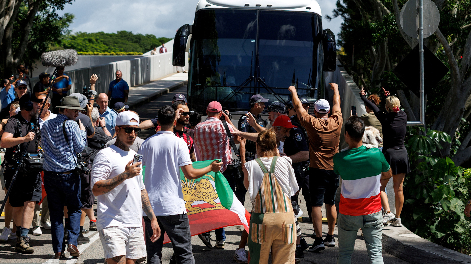 Protesters block Iran women's football team bus